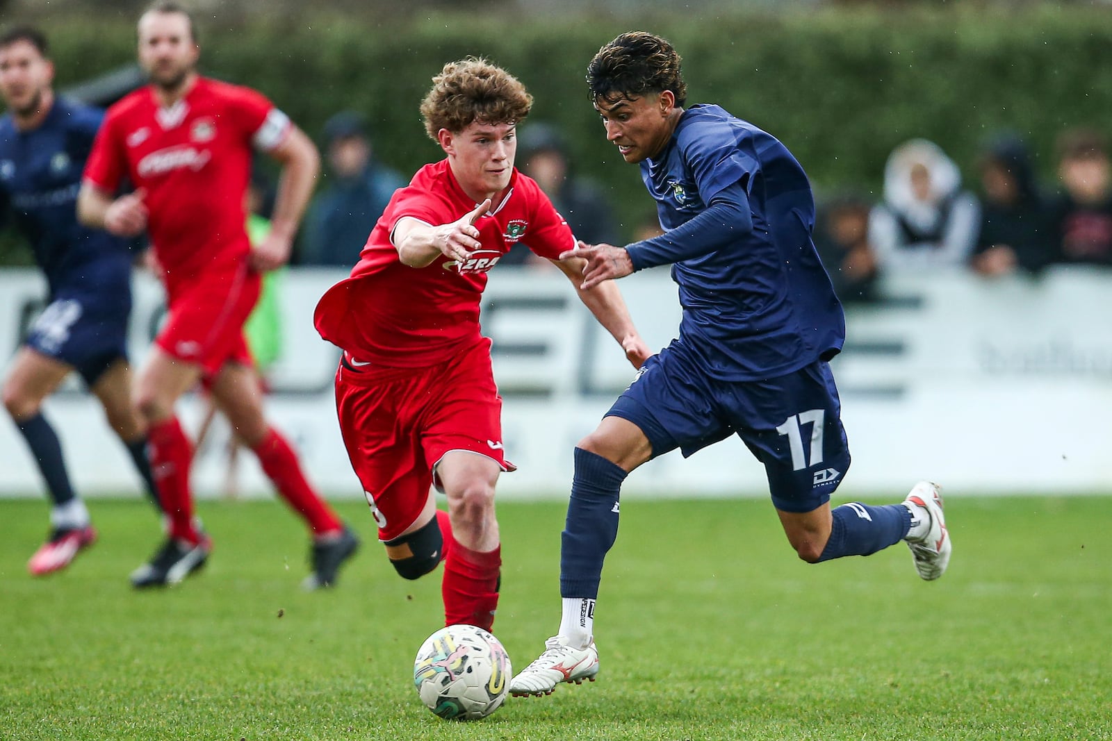 Auckland City's Jerson Lagos, right, competes for the ball with Melville United's Issac Bates during a Northern League soccer match at Gower Park in Hamilton, New Zealand, Aug. 31, 2024. (Andy Skinner/Photosport via AP)