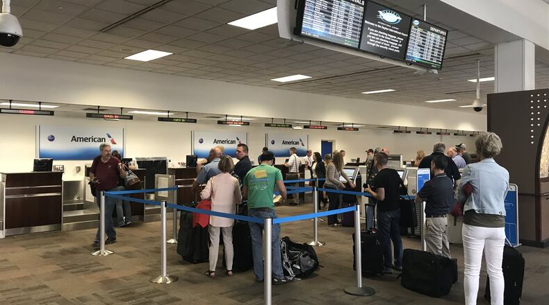 Passengers are shown inside the Dayton International Airport. KARA DISCOLL/STAFF