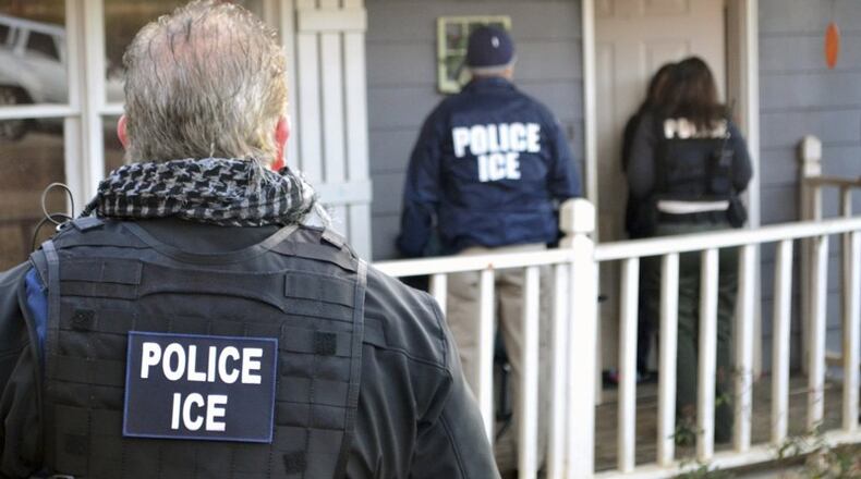 Feb. 9, 2017: Federal immigration agents visited a home in the Atlanta area during a nationwide operation last week. More than 680 people were arrested in the roundups, which targeted immigrants living illegally in the United States. (Bryan Cox/ICE via AP)