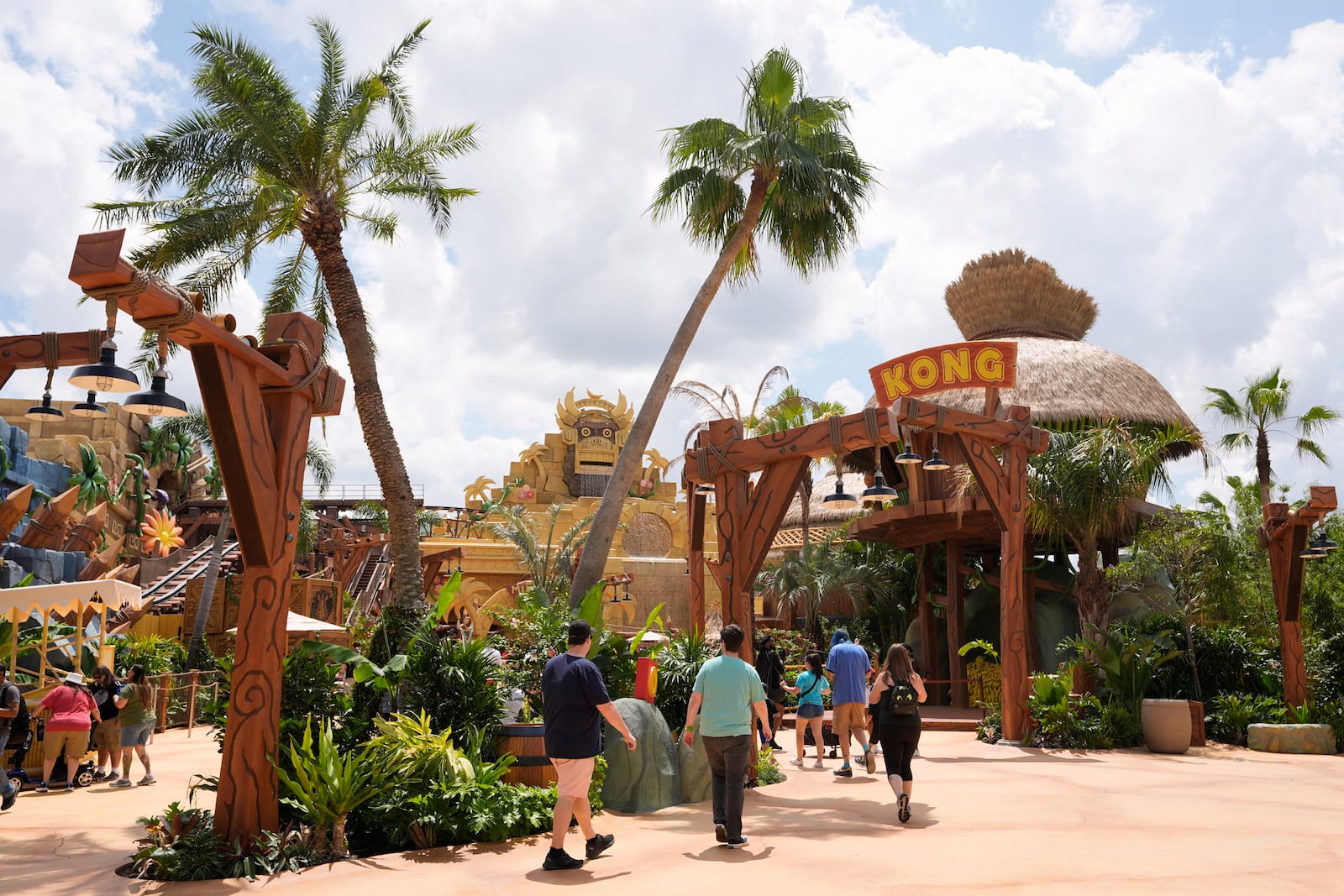 Guests stroll around the various parts of Super Nintendo World at Epic Universe at Universal Resort Orlando Thursday, April 10, 2025, in Orlando, Fla. (AP Photo/John Raoux)
