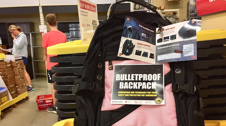 School backpacks are coming under the increasingly focus of security concerns. Hamilton Schools has a new, stricter policy on students’ book bags for the coming school year. And in West Chester Township, an office supply store was offering a bullet-proof backpack for sale. The backpacks are just a part of an increasing security awareness adopted by school districts locally and nationally in the wake of shooting massacres this past school year at Florida and Texas high schools.(Photo by Michael D. Clark/Journal-News)