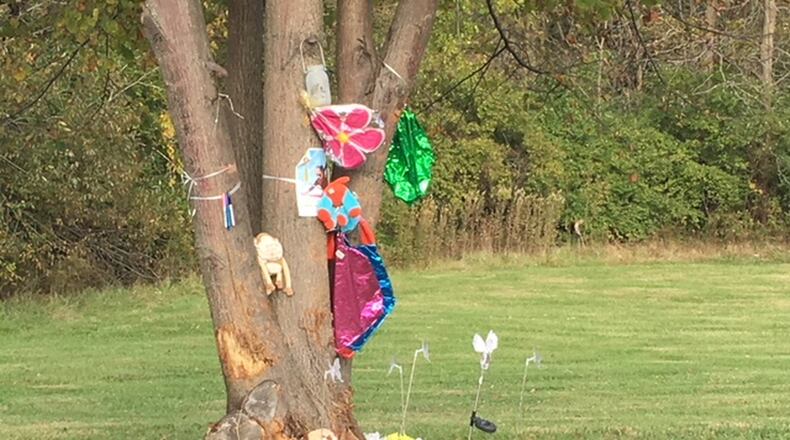 A makeshift memorial stands on North Bickett Road near U.S. 42 in Wilberforce, where Wilberforce University student Alexandria Austin was killed in a Sept. 26 crash. Richard Wilson/Staff