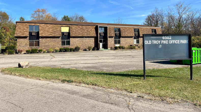 A former office building in Huber Heights, near the intersection of Old Troy Pike and Chambersburg Road, will soon be renovated into a multi-tenant salon. AIMEE HANCOCK/STAFF