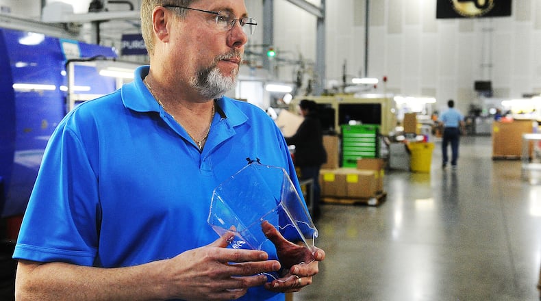 Brian O'Leary owner of on Innovative Plastic Molders, in Vandalia talks about celebrating its 20th anniversary being open. MARSHALL GORBY\STAFF