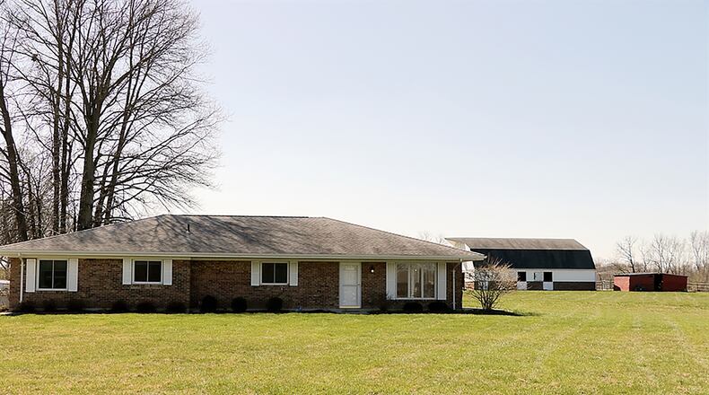 The ranch home has about 1,820 sq. ft. of living space and features panoramic views of the tree-lined fenced pasture and out-buildings. CONTRIBUTED PHOTO BY KATHY TYLER