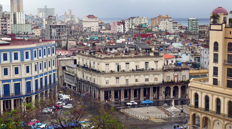 Storm clouds roll through Old Havana Tuesday afternoon, Sept. 26, 2017. Havana has cleaned up a lot of the debris and damage done by the wind and storm surge from Hurricane Irma's outer bands. (Emily Michot/Miami Herald/TNS)
