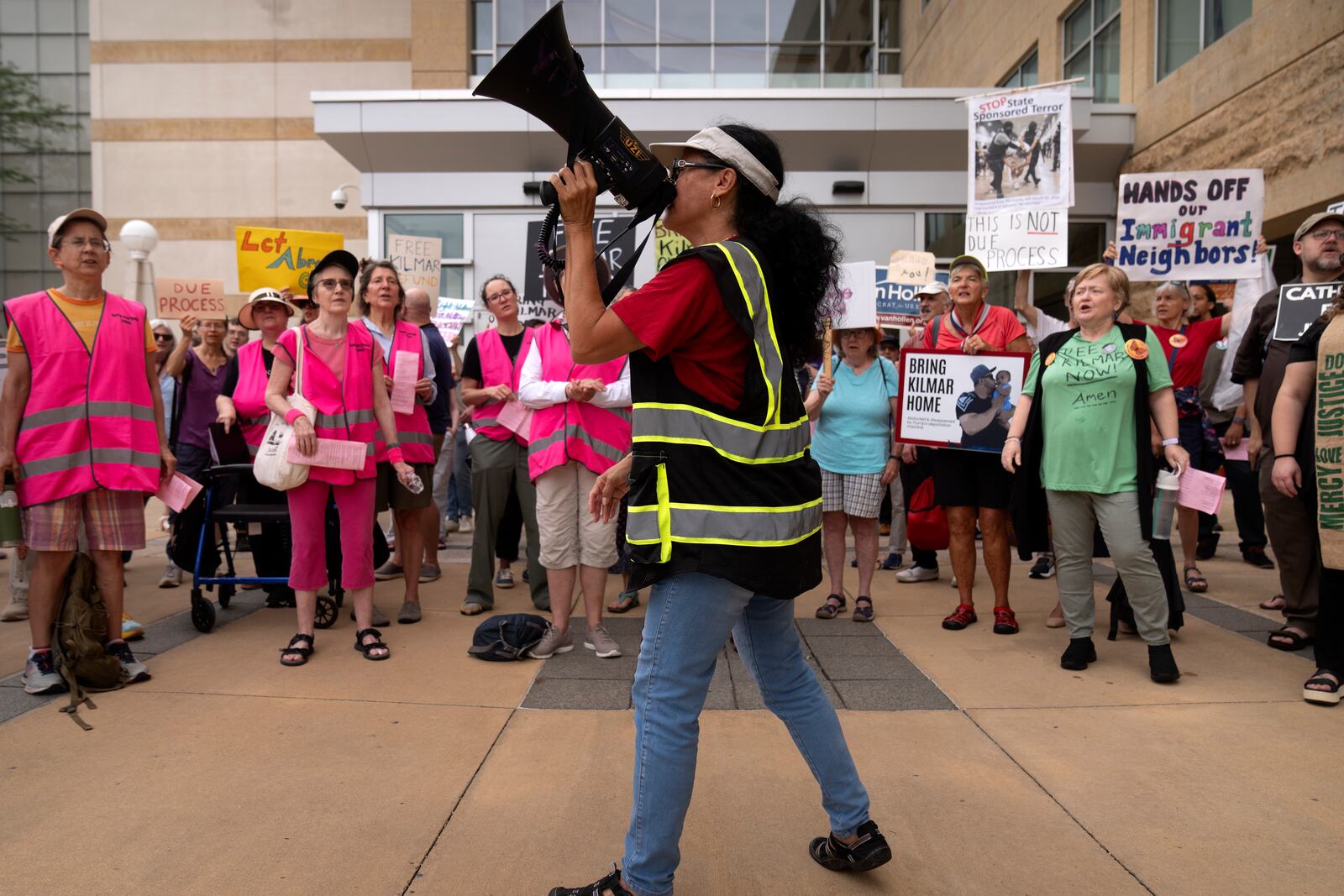 Supporters of Kilmar Abrego Garcia rally outside of the U.S. District Court in Greenbelt, Md., where a hearing was scheduled to be held on returning him to Maryland, Monday, July 7, 2025. (AP Photo/Mark Schiefelbein)