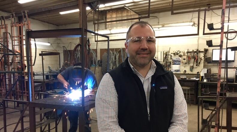 Jonathan Foley, director of manufacturer for Moraine’s Rack Processing, is set to become chairman of the Dayton Region Manufacturers Association next year. At 34, he’s a Millennial who hopes to show fellow young people that the field of manufacturing offers good careers. THOMAS GNAU/STAFF