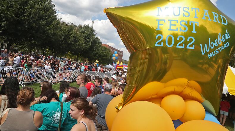 One of the highlights of MustardFEST is the Champion City Wiener Dog Races Saturday, Sept. 17, 2022 at National Road Commons Park in Springfield. BILL LACKEY/STAFF