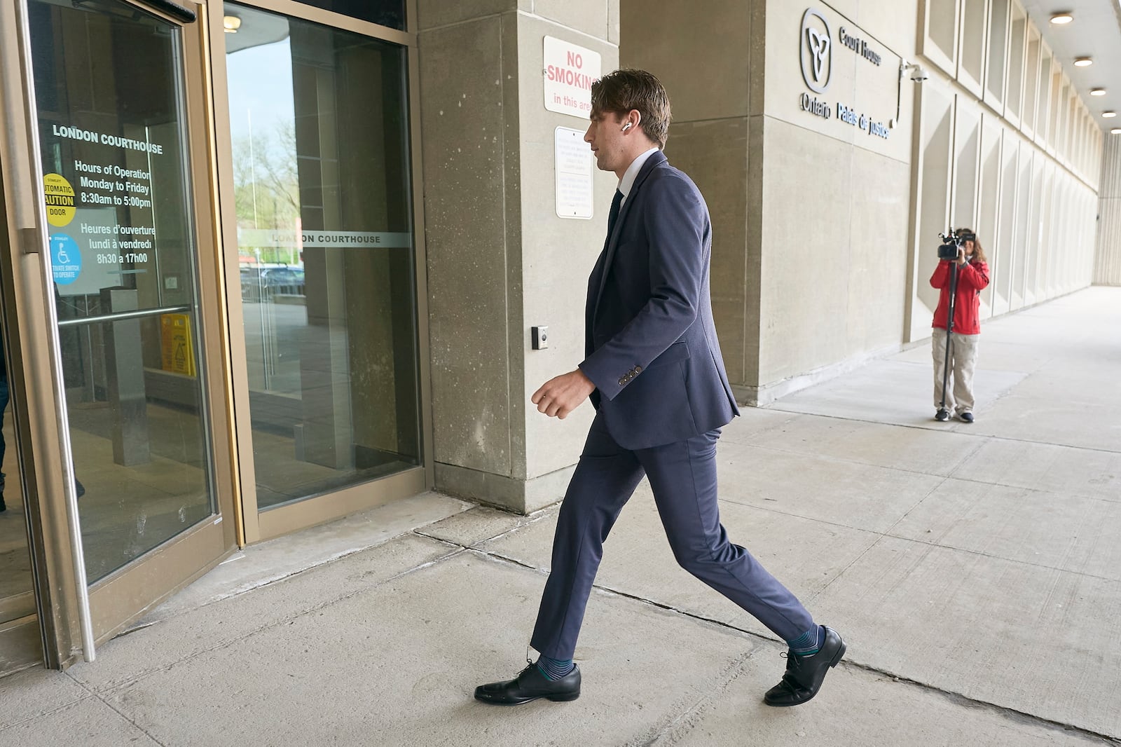 Michael McLeod, one of five hockey players charged with sexual assault, arrives at the courthouse in London, Ontario, Thursday, May 8, 2025. (Geoff Robins/The Canadian Press via AP)