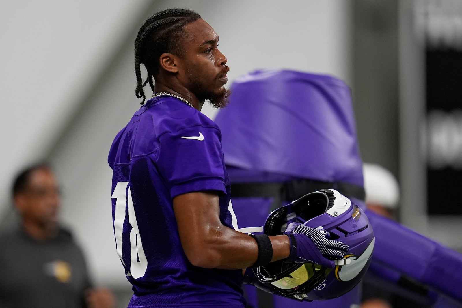 Minnesota Vikings wide receiver Justin Jefferson (18) stands on the field during the team's NFL football training camp Wednesday, July 23, 2025, in Eagan, Minn. (AP Photo/Abbie Parr)