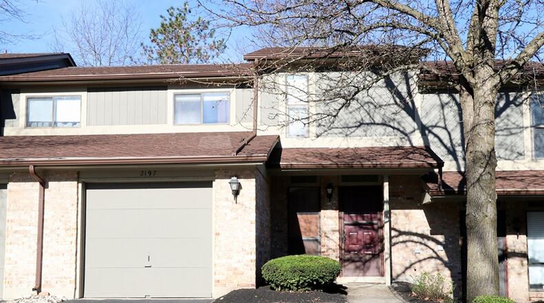 The 2-story condo at 2197 Kyle Lane has about 1,440 sq. ft. of living space. The middle unit is located on a private lane with a mature tree line to the rear. It has a 1-car garage. CONTRIBUTED PHOTO BY KATHY TYLER