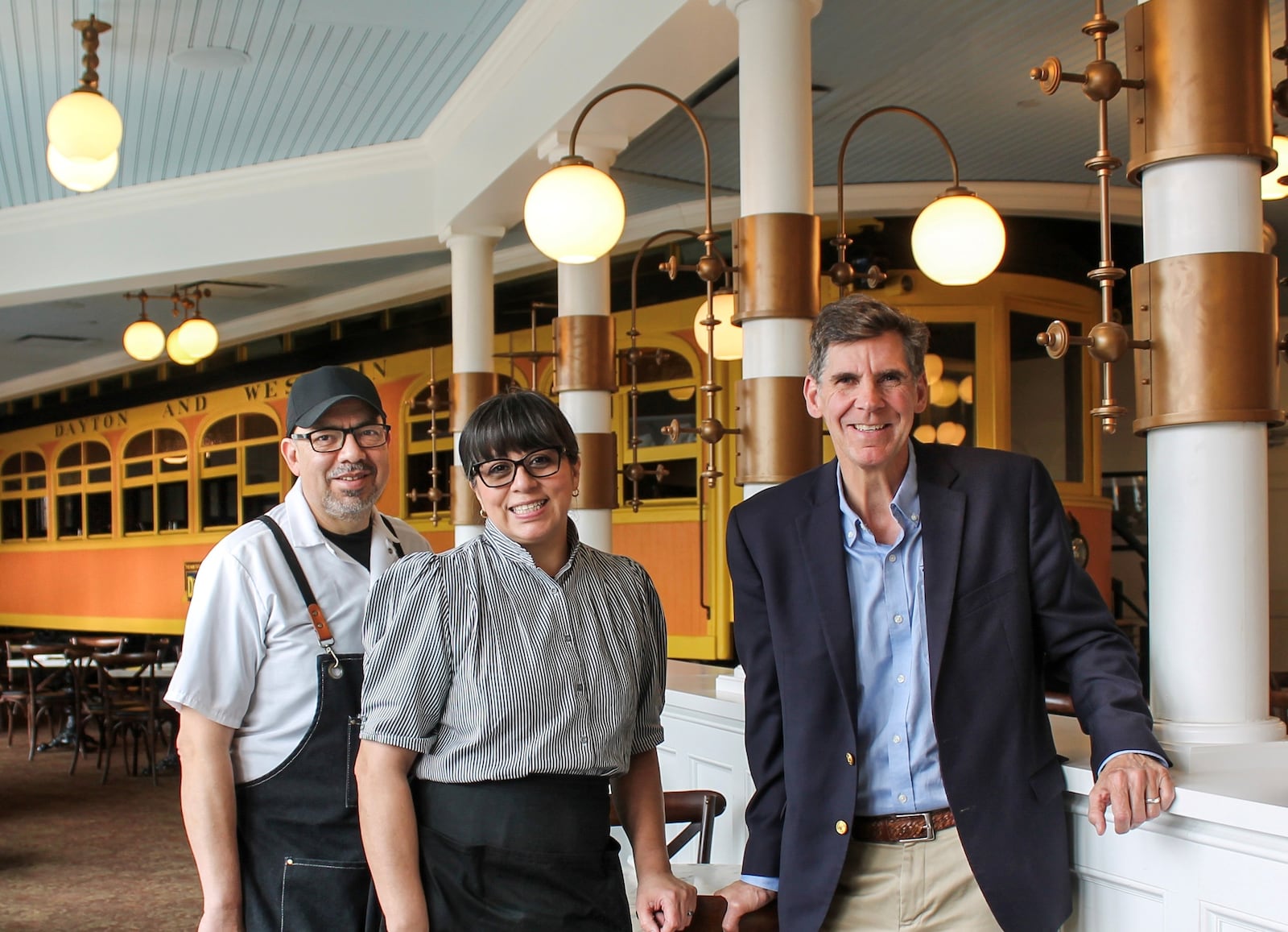Jose and Carol Calzada of Calzada’s Kitchen began operating Culp's Café in April. They are pictured with Brady Kress, president and CEO of Dayton History (CONTRIBUTED PHOTO).
