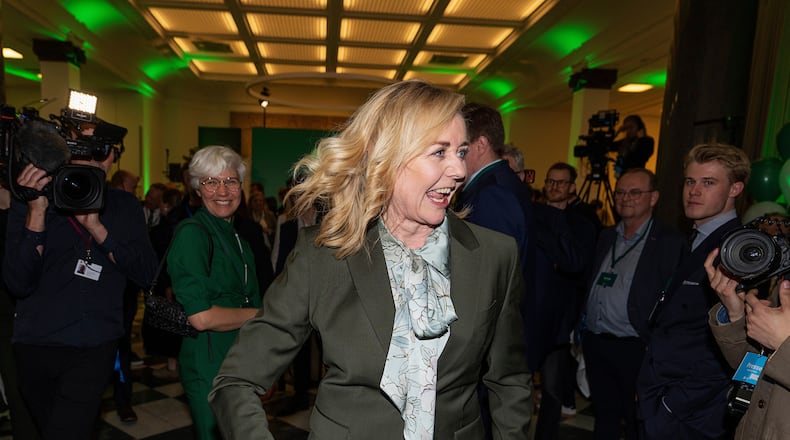Leader of the Conservative People's Party, Mona Juul, arrives at an election party after the parliamentary election at Tietgen's House, in Copenhagen, Tuesday, March 24, 2026. (Claus Bech/Ritzau Scanpix via AP)