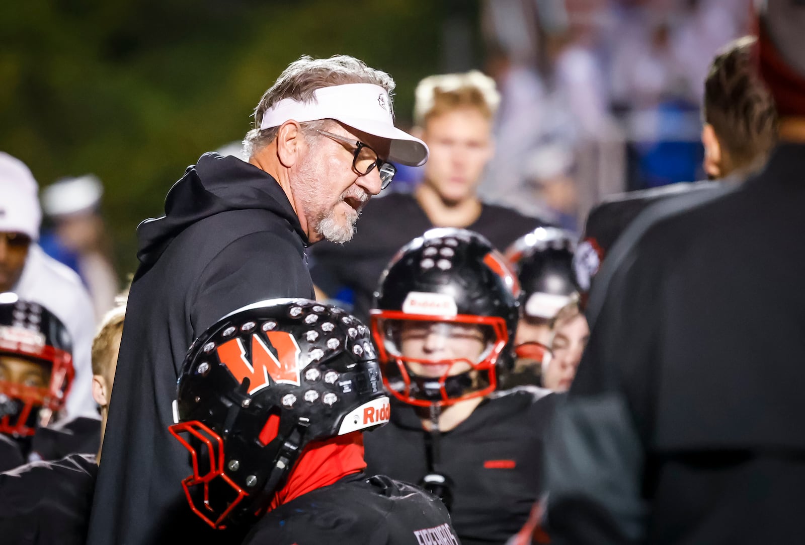 Lakota West's head coach Tom Bolden talks to his team after their Division 1 playoff football game against St. Xavier Friday, Nov. 15, 2024 at Princeton's Mancuso Field in Sharonville. St. Xavier won 16-13 to advance. NICK GRAHAM/STAFF