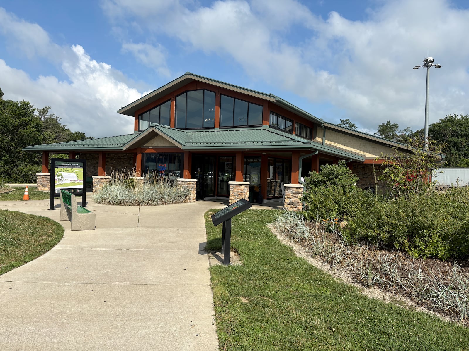 The rest stop on southbound Interstate 71 in Warren County will have the state's largest expansion of commercial truck parking spaces. Gov. Mike DeWine announced Tuesday, July 29, 2025, at the rest stop that at least 1,400 truck parking spaces will be added at 33 sites in 19 counties. JEN BALDUF/STAFF