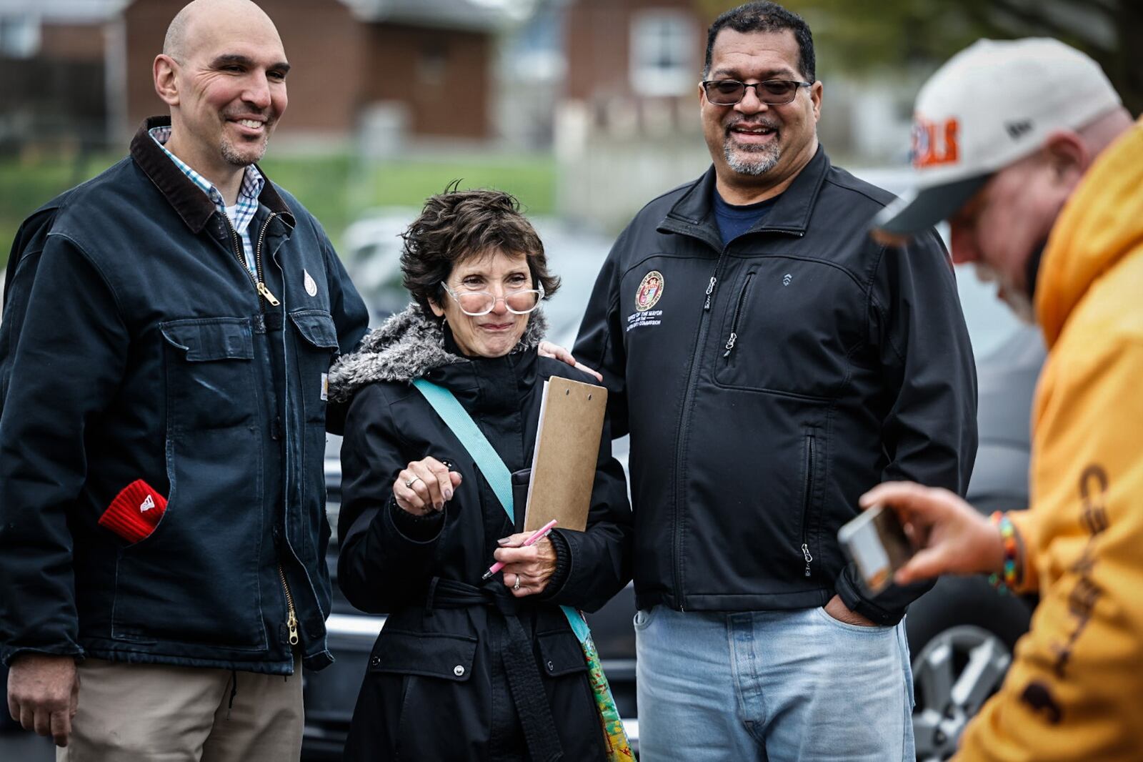 Dayton City Commissioners Matt Joseph, left and Chris Shaw pose for a photo with Barb Bayliff on Election Day, May 2, 2023 at Our Lady of Immaculate Conception Church on Smithville Road. JIM NOELKER/STAFF