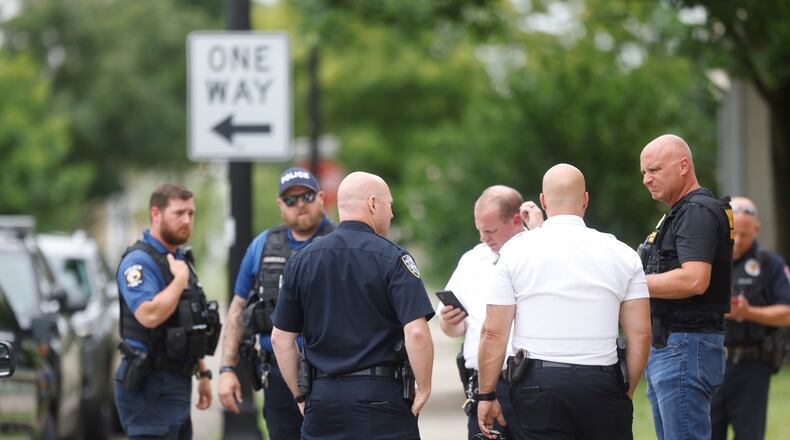 Dayton police along with other agencies apprehended two car jacking suspects in Dayton at Hawthorn and West Fourth streets on Wednesday, June 30, 2021. JIM NOELKER / STAFF