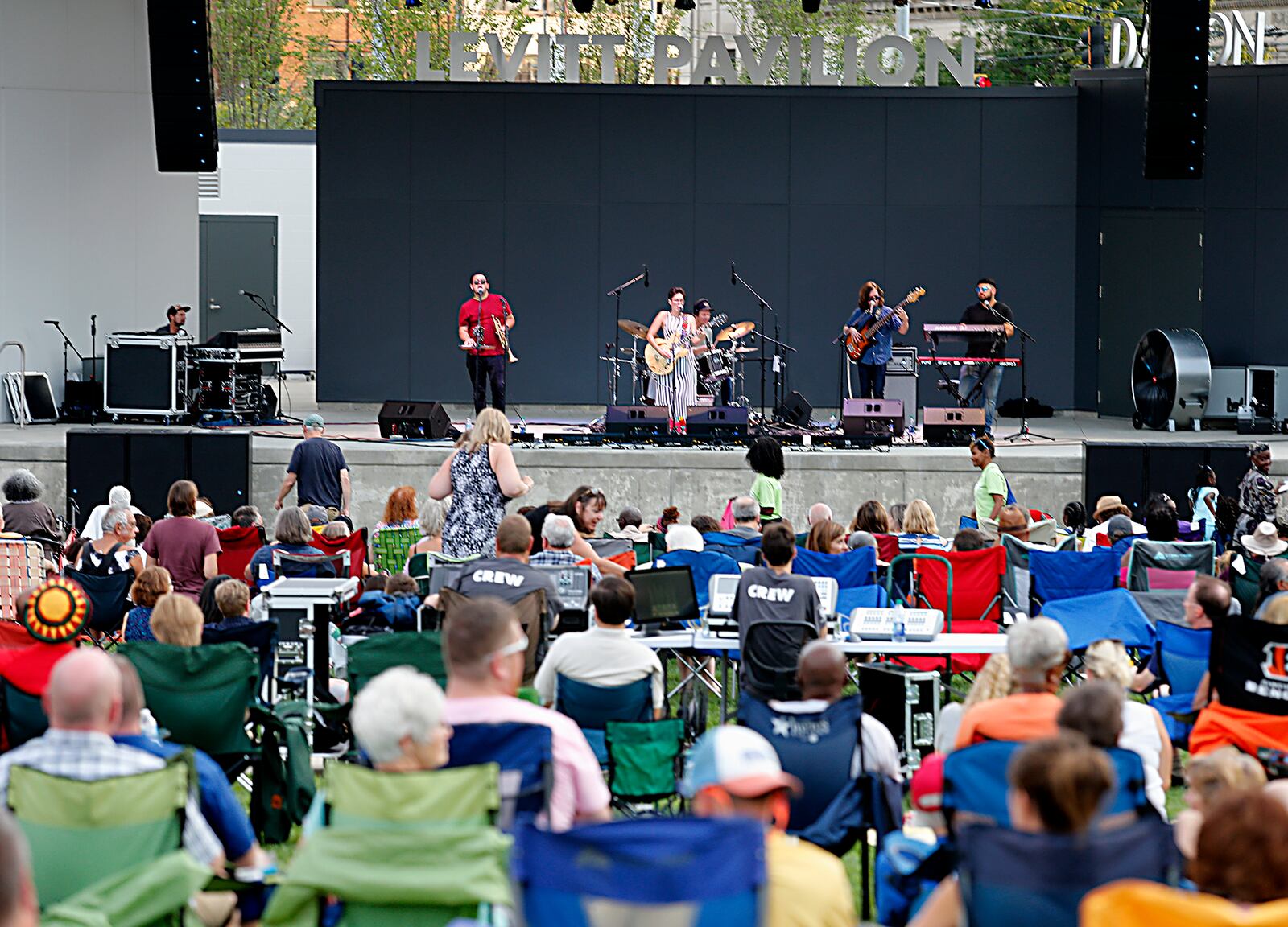 Texas-based singer Gina Chavez performs at the Levitt Pavilion in a dress she bought from Clash in Dayton.