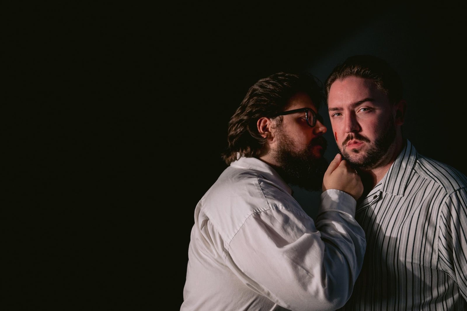 Skyler McNeely (left as Beadle Bamford) and Justin King (Judge Turpin) in TheatreLab Dayton's production of "Sweeney Todd." PHOTO BY KNACK PHOTO + VIDEO