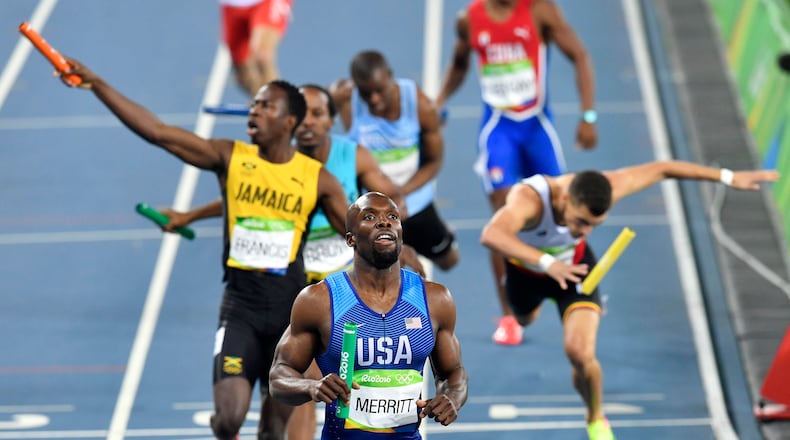 United States' Lashawn Merritt crosses the line to win the men's 4x400-meter relay final during the athletics competitions of the 2016 Summer Olympics at the Olympic stadium in Rio de Janeiro, Brazil, Saturday, Aug. 20, 2016. (AP Photo/Martin Meissner)