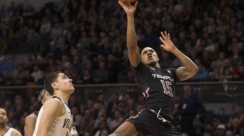 VILLANOVA, PA - DECEMBER 05: Nate Pierre-Louis #15 of the Temple Owls shoots the ball against Cole Swider #10 of the Villanova Wildcats in the second half at Finneran Pavilion on December 5, 2018 in Villanova, Pennsylvania. The Villanova Wildcats defeated the Temple Owls 69-59. (Photo by Mitchell Leff/Getty Images)