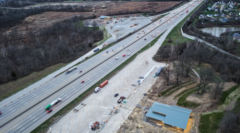 Two new rest stops are taking shape along north and southbound I-75 in Butler County, just south of the SR 63 and I-75 interchange in Monroe. State transportation officials say the two rest areas now under construction are scheduled to open in late summer and will feature more truck parking. Aerial photo view is looking south along I-75. (Photo By Nick Graham/ Journal-News)