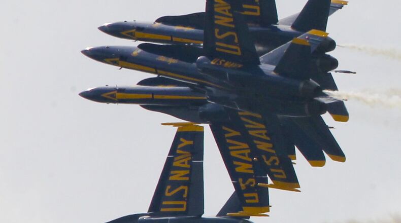 The U.S. Navy Blue Angels perform during the Vectren Dayton Air Show held at the Dayton International Airport, Sunday, June 29, 2014. GREG LYNCH / STAFF