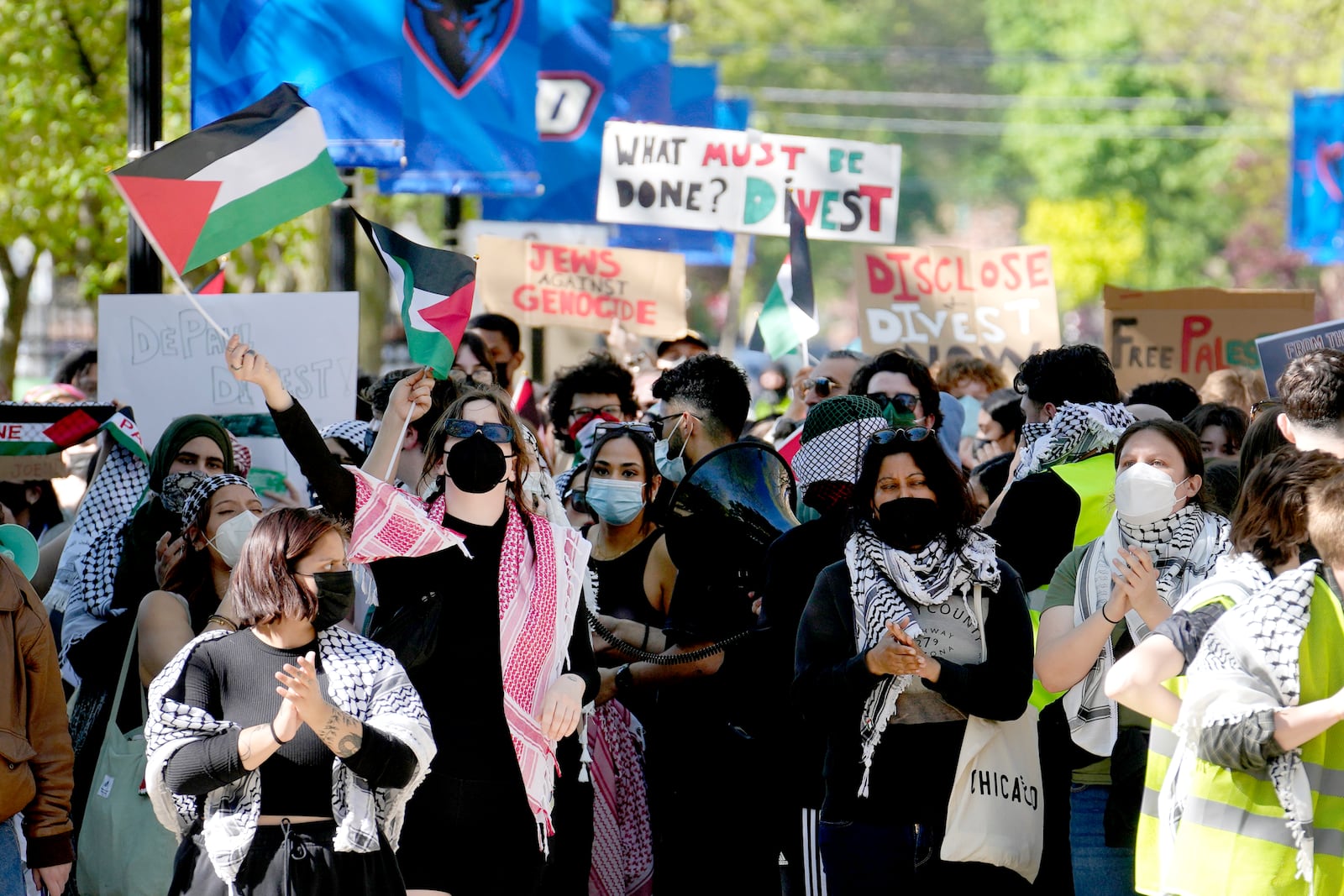 FILE- Pro-Palestinian protesters demonstrate on the campus of DePaul University, April 30, 2024, in Chicago. (AP Photo/Charles Rex Arbogast, file)