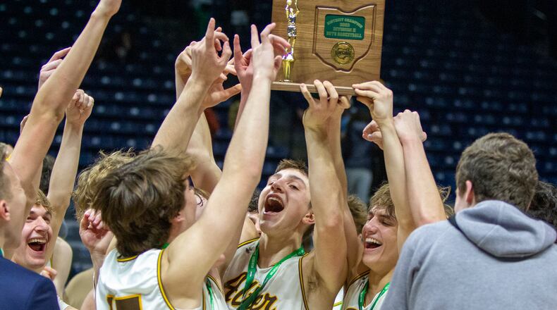 Anthony Ruffolo (center) and his Alter teammates celebrate their second straight Division II district championship at the Cintas Center on Sunday. CONTRIBUTED/Jeff Gilbert