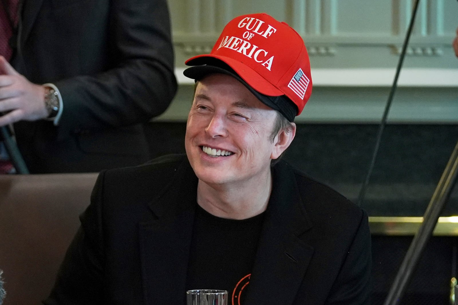 Elon Musk listens during a cabinet meeting at the White House, Wednesday, April 30, 2025, in Washington. (AP Photo/Evan Vucci)