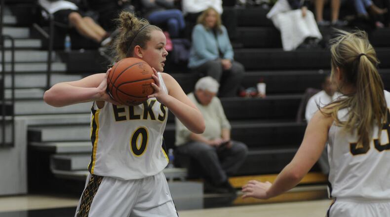 Centerville’s Megan Johnson secures a rebound. Centerville defeated visiting Springfield 71-35 in a girls high school basketball game on Wed., Dec. 13, 2017. MARC PENDLETON / STAFF