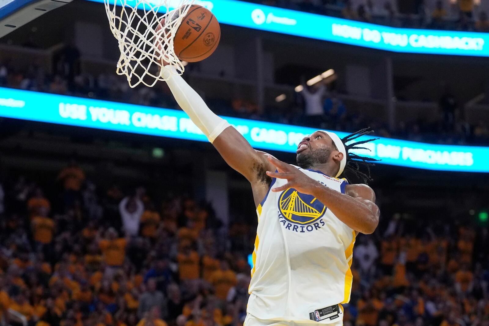 Golden State Warriors guard Buddy Hield scores against the Houston Rockets during the first half of Game 3 of an NBA basketball first-round playoff series in San Francisco, Saturday, April 26, 2025. (AP Photo/Jeff Chiu)