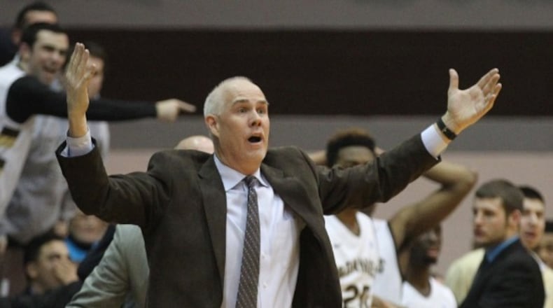St. Bonaventure coach Mark Schmidt protests a call during a game against Dayton. David Jablonski/Staff