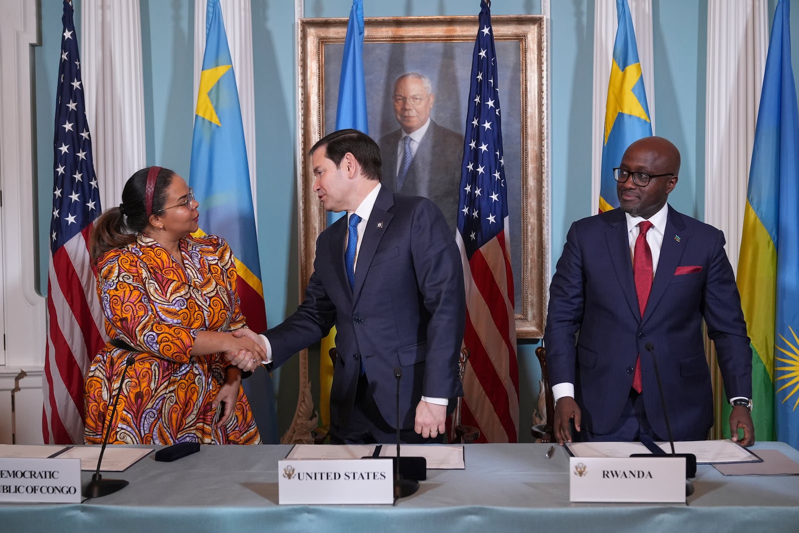 Secretary of State Marco Rubio hosts a Declaration of Principles signing ceremony with Congo's Foreign Minister Therese Kayikwamba Wagner, left, and Rwanda's Foreign Minister Olivier Nduhungirehe, right, Friday, April 25, 2025, at the State Department in Washington. (AP Photo/Jacquelyn Martin)