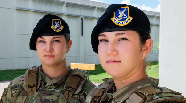 Airmen 1st Class Hailey and Hannah Browning are twin sisters assigned to the 88th Security Forces Squadron at Wright-Patterson Air Force Base. Originally from Aberdeen, South Dakota, the sisters joined the Air Force through the buddy system and will soon be moving to their second duty station together. U.S. AIR FORCE PHOTO/WESLEY FARNSWORTH