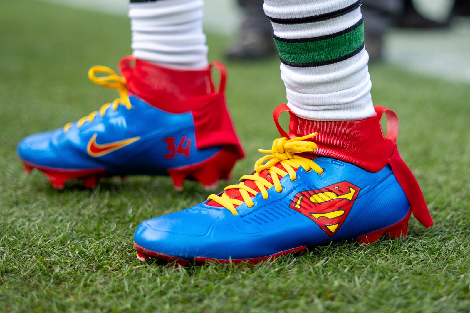 FILE - Philadelphia Eagle cornerback Isaiah Rodgers (34) wearing Superman cleats during warm-ups prior to the NFL football game against the Dallas Cowboys, Sunday, Dec. 29, 2024, in Philadelphia. (AP Photo/Chris Szagola, file)