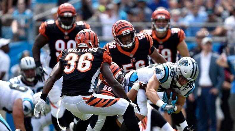 Christian McCaffrey #22 of the Carolina Panthers runs the ball against the Cincinnati Bengals in the first quarter during their game at Bank of America Stadium on September 23, 2018 in Charlotte, North Carolina. (Photo by Grant Halverson/Getty Images)
