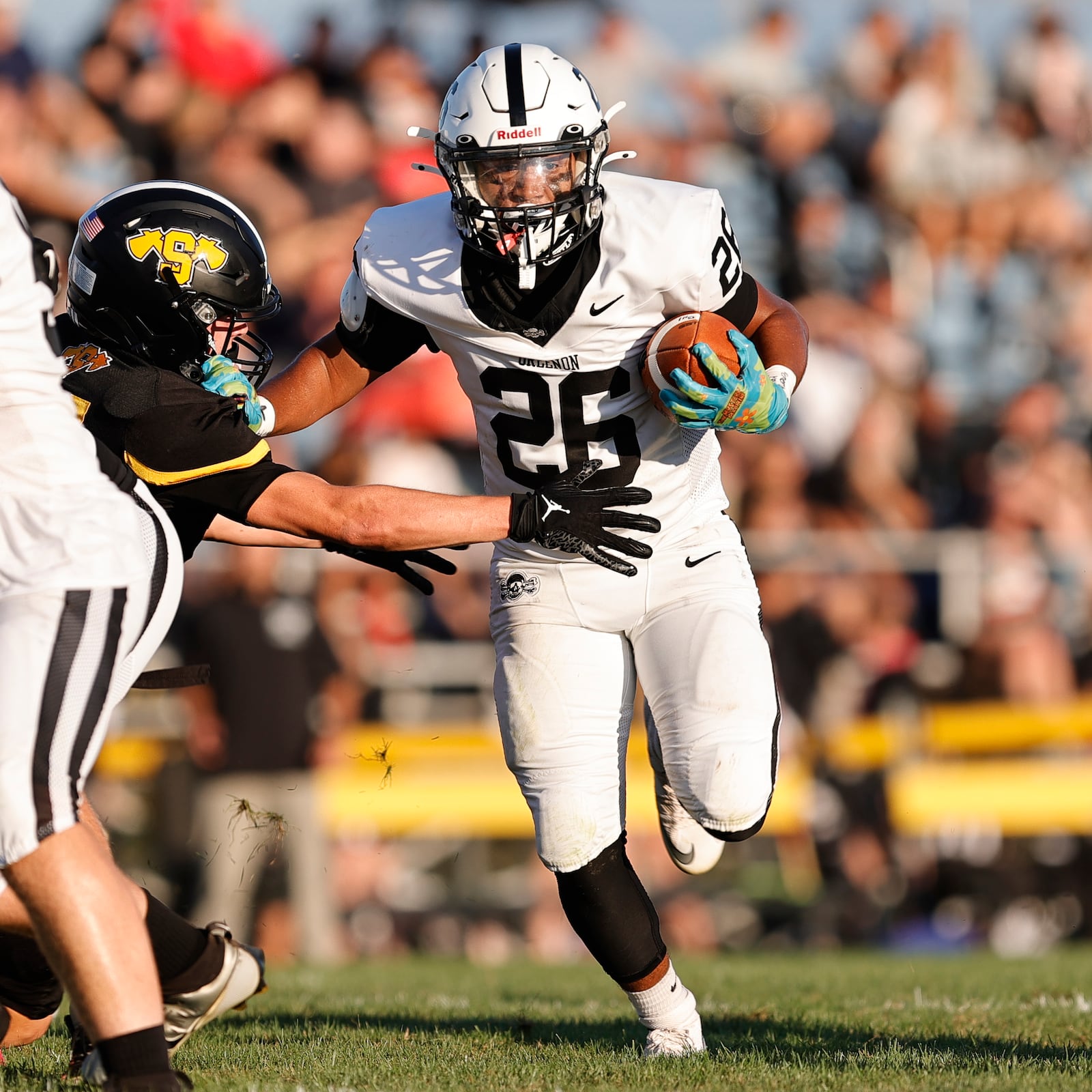 Greenon High School senior Kai Ricks runs the ball during their game at Shawnee on Friday, Aug. 22 in Springfield. The Knights won 34-14. MICHAEL COOPER/STAFF