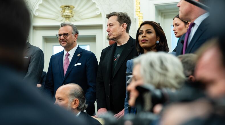 Elon Musk, second from left, listens as President Cyril Ramaphosa of South Africa meets with President Donald Trump in the Oval Office in the White House in Washington, on Wednesday, May 21, 2025. Musk has criticized the far-reaching Republican bill intended to enact Trump’s domestic policy agenda, saying it would undermine the administration’s own efforts to shrink federal spending. (Eric Lee/The New York Times)
