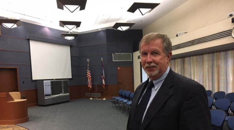 Dave Hicks in his natural element, at Moraine city hall council chambers. THOMAS GNAU/STAFF