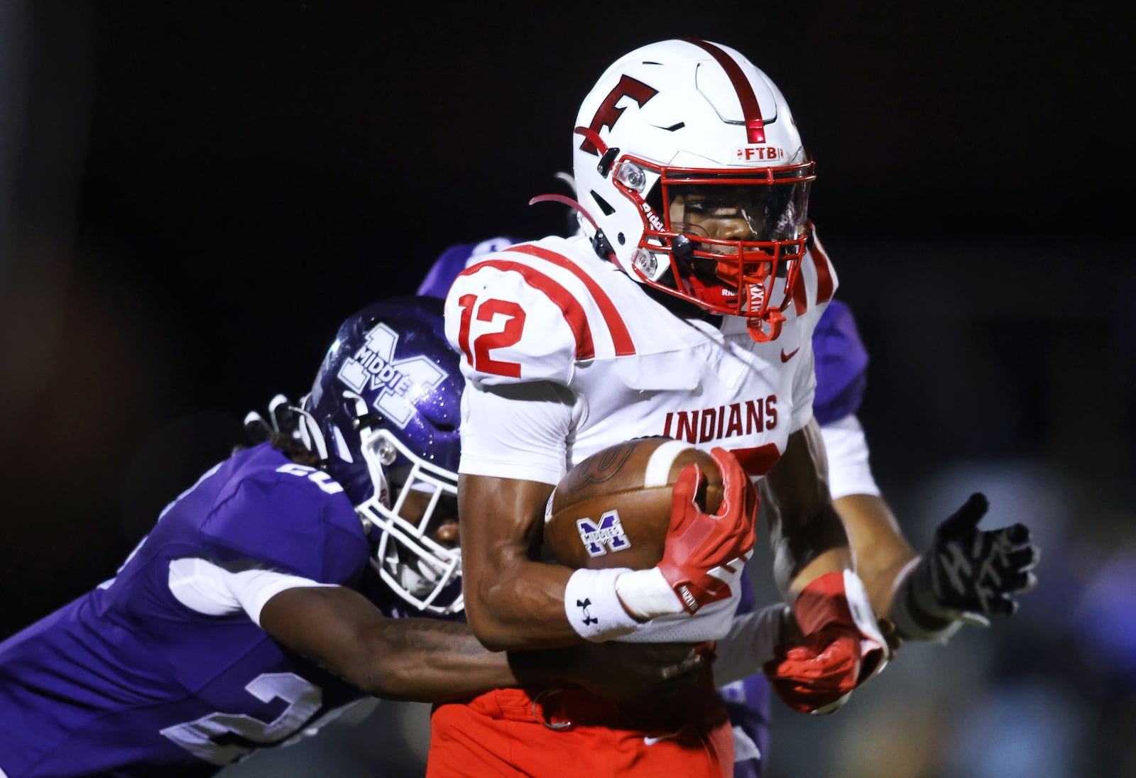 Fairfield's John Abramson carries the ball during their football game against Middletown Friday Aug. 29, 2025 at Barnitz Stadium. Middletown won 19-2. NICK GRAHAM/STAFF