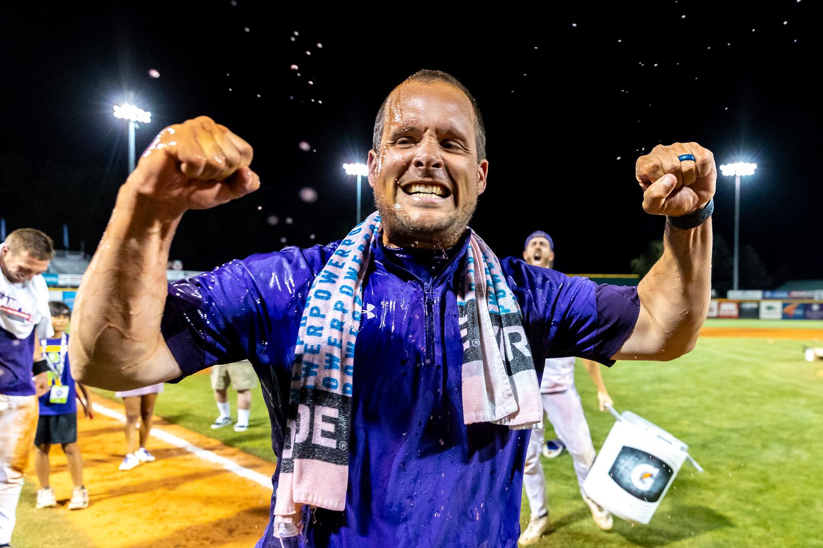 LSU Shreveport head coach Brad Neffendorf reacts after he doused by his players after defeating Southeastern of Florida to win the championship game of the NAIA World Series colllege baseall game, Friday, May 30 2025, at Harris Field in Lewiston, Idaho. (August Frank/Lewiston Tribune via AP)
