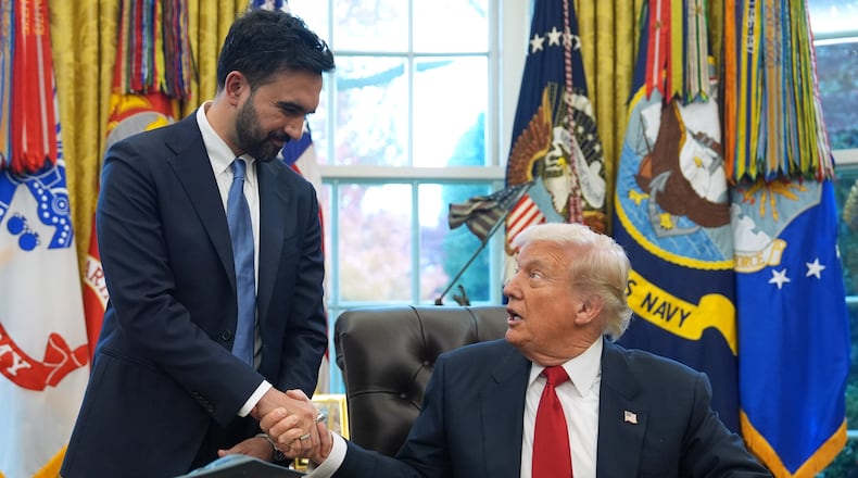 President Donald Trump shakes hands with New York City Mayor-elect Zohran Mamdani in the Oval Office of the White House, Friday, Nov. 21, 2025, in Washington. (AP Photo/Evan Vucci)