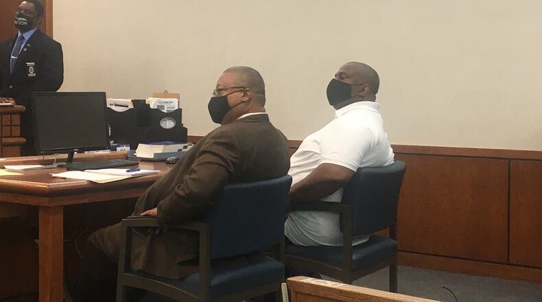 Sean Belyeu (right) sits next to his attorney Ben Swift Tuesday during a sentencing hearing in Dayton Municipal Court.