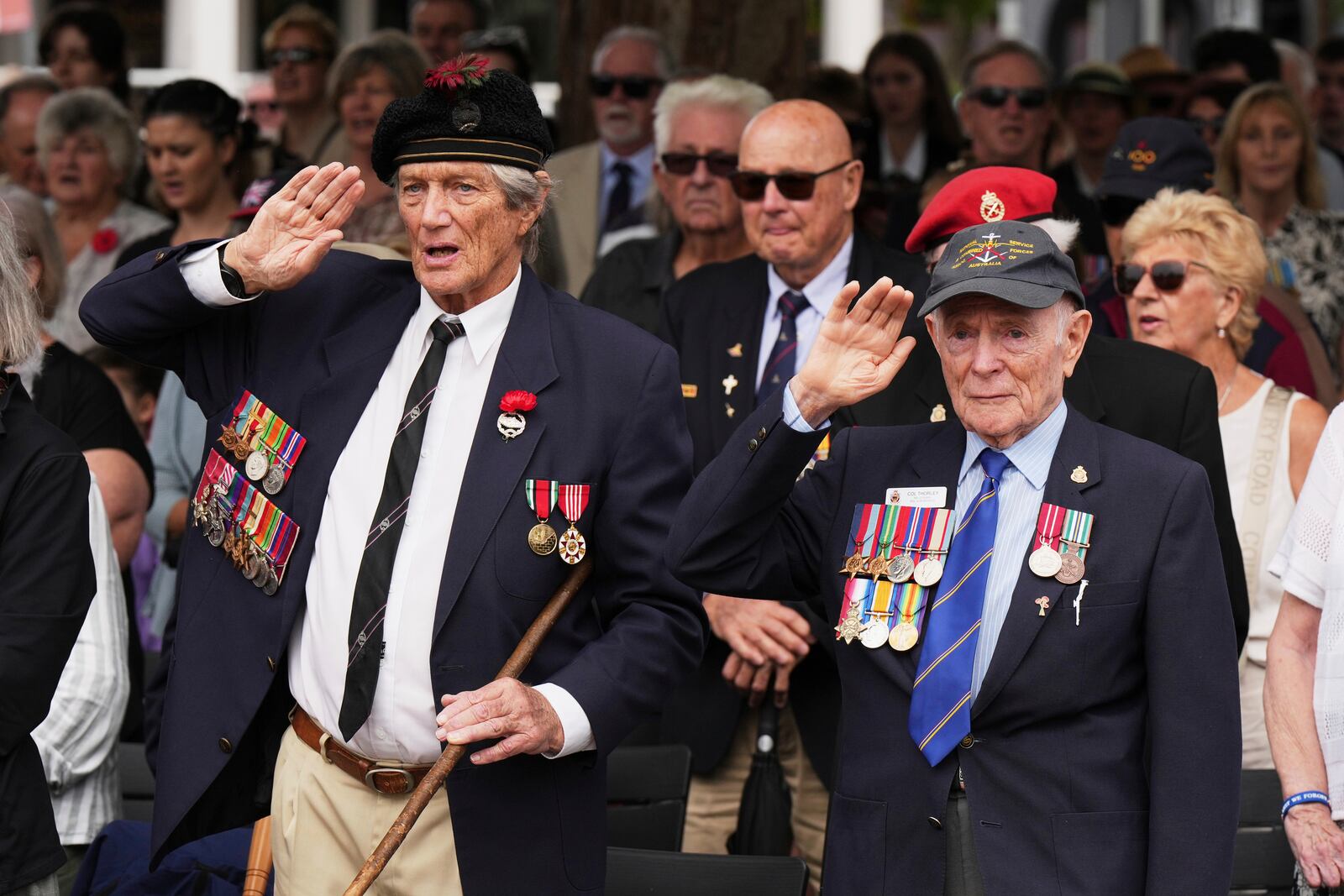 Veterans salute during the Anzac Day commemorations to honor their war dead in Nelson Bay, Australia, Friday, April 25, 2025. (AP Photo/Mark Baker)