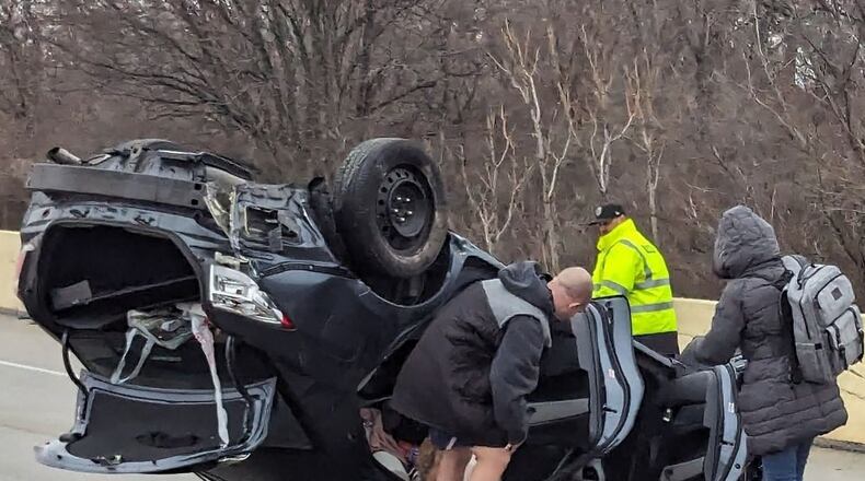 A one-vehicle rollover crash occurred Saturday, Jan. 6, 2024, on State Route 4 at Interstate 75 North in Dayton. Photo by Sharyn Boyle.