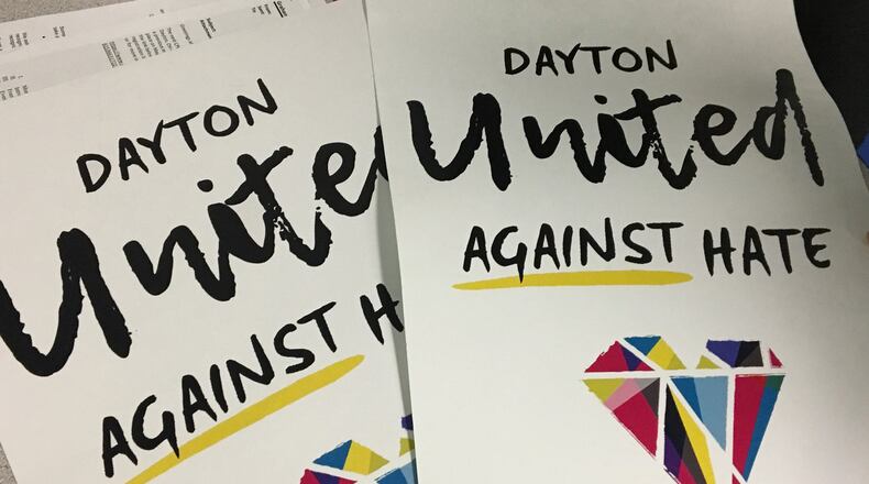 Dayton United Against Hate campaign posters will appear as full pages in future editions of the Dayton Daily news on Sunday and May 23. The campaign was created to counter a KKK group’s message but organizers hope the effort continues after a May 25 Klan rally. CHRIS STEWART / STAFF