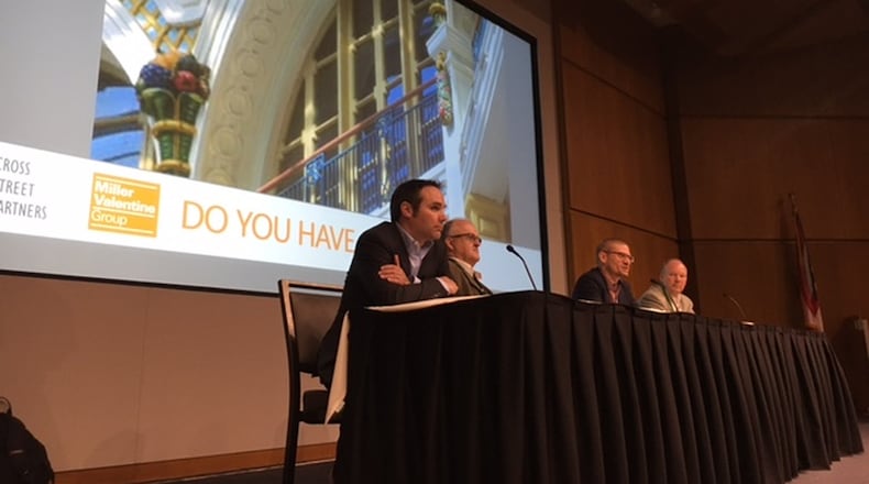 Talking downtown development: From left, Scott Murphy, of the Downtown Dayton Partnership; John Gower, of Citywide Development: Scott Gibson, a developer of Dayton’s “Fire Blocks;” and Dave Williams, a Miller Valentine executive. THOMAS GNAU/STAFF