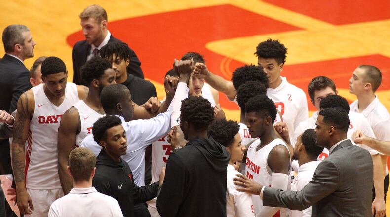 Dayton huddles during a game against Purdue Fort Wayne on Friday, Nov. 16, 2018, at UD Arena. David Jablonski/Staff